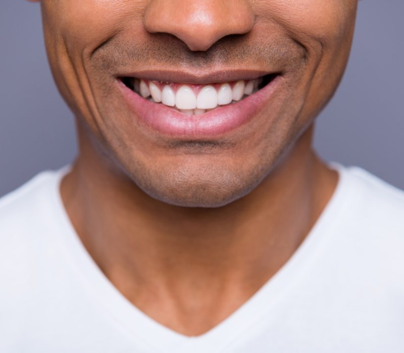 Close-up cropped portrait of his he nice handsome attractive well-groomed cheerful cheery guy wearing white shirt beaming teeth isolated over gray violet purple pastel background