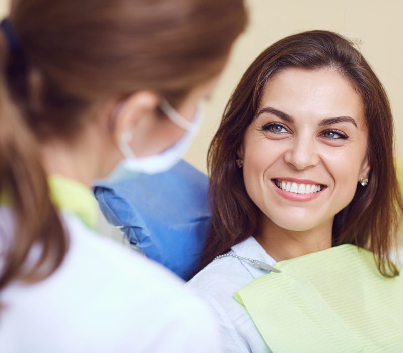 A girl and a dentist in a dental clinic.